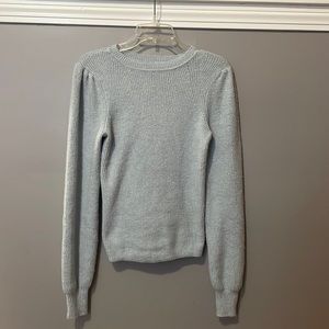 light blue sweater